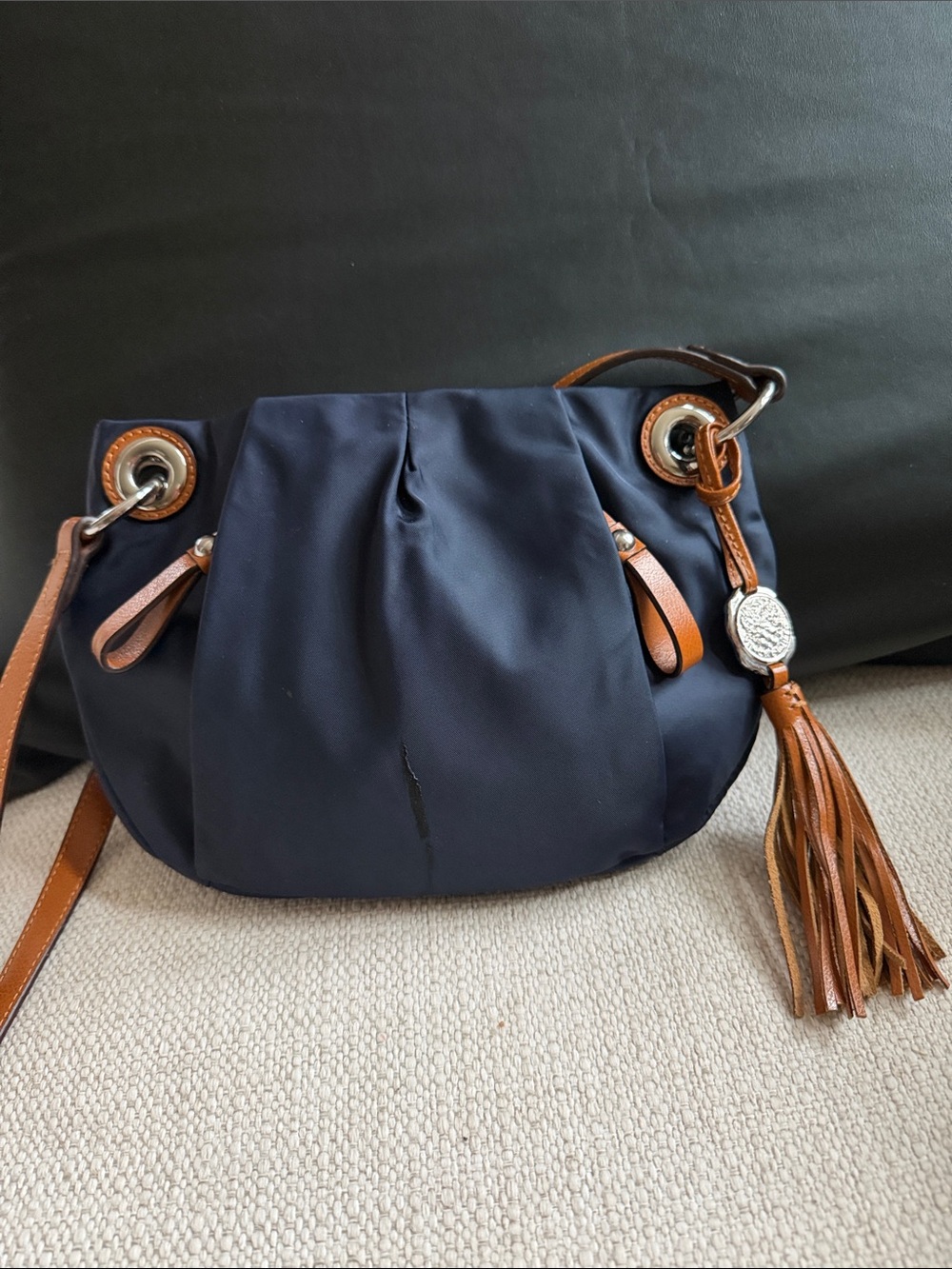Navy Fabric Shoulder Bag with Tan Leather Trim and Tassel Accent